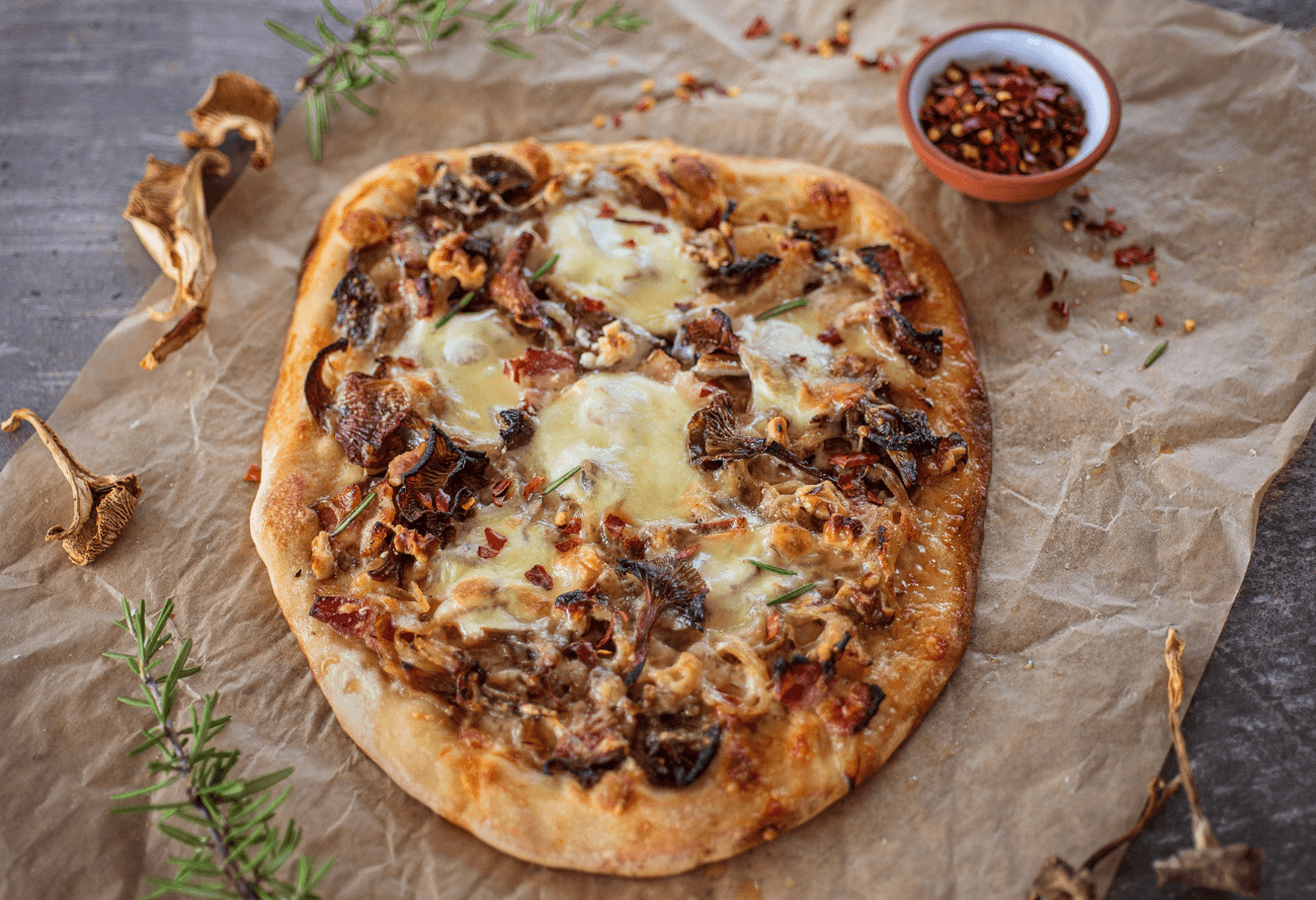 Morel Mushrooms on the cutting board wild-mushrooms-pizza
